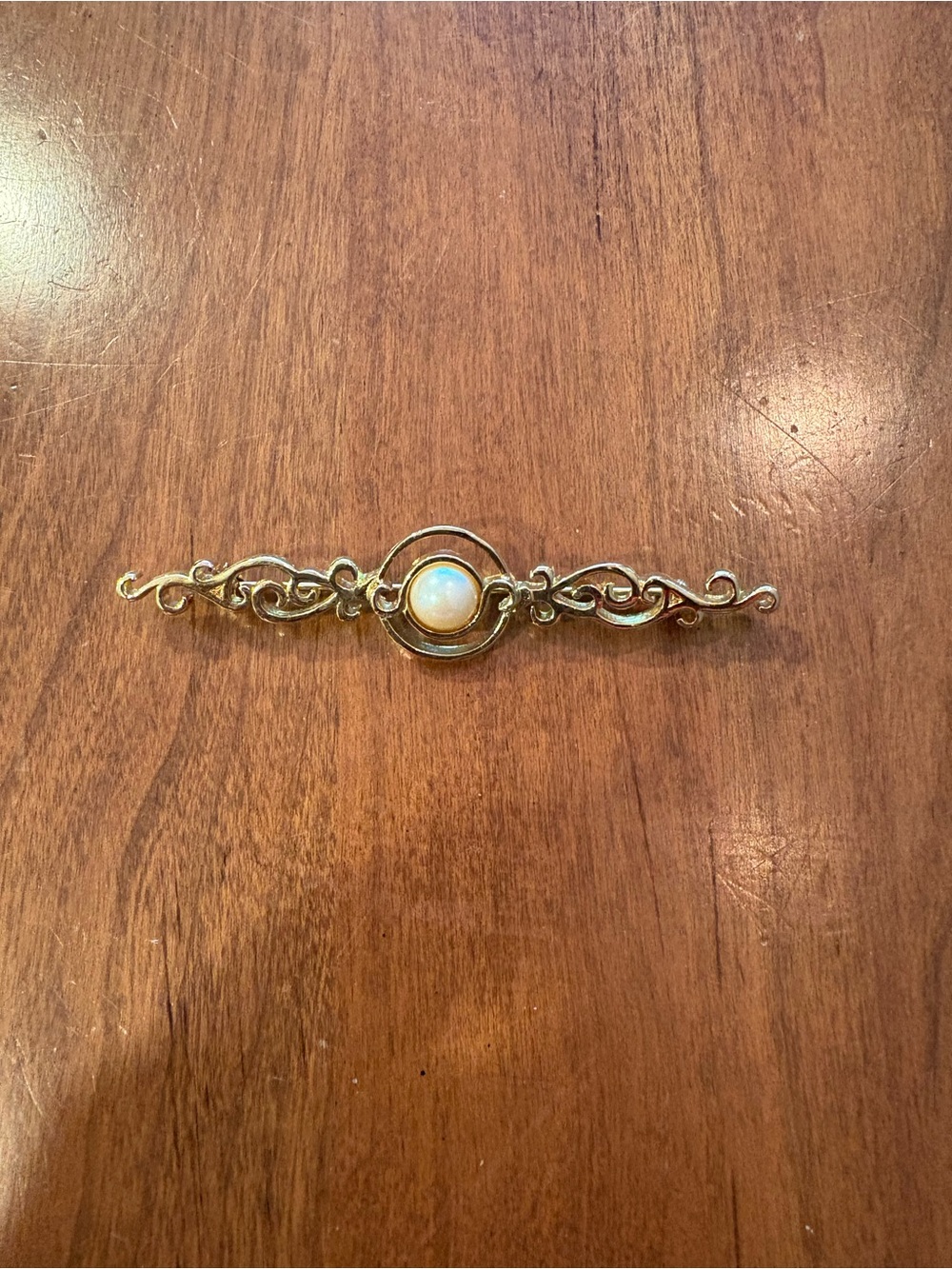 Vintage Monet Gold-tone Bar Pin with Central Opalescent Cabochon faux pearl